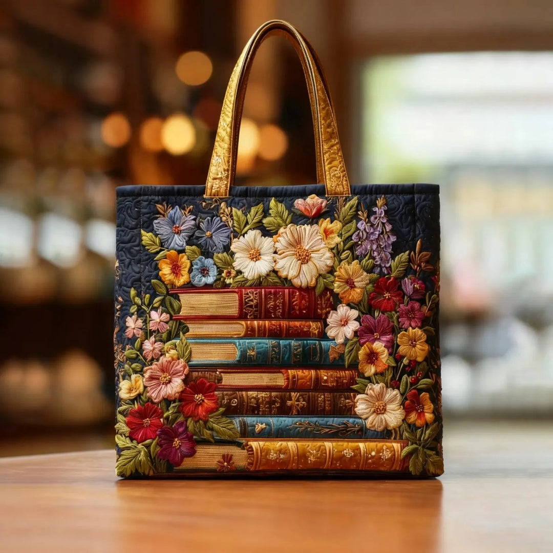 Blütendruck und Bücher – Gesteppte Tasche