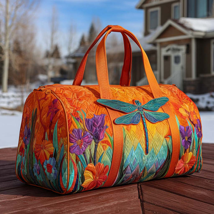 Flügel und Wildblumen – Gesteppte Reisetasche