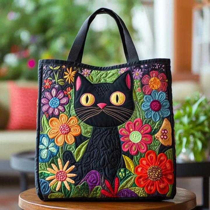 Verzauberte schwarze Katze – Gesteppte Tasche